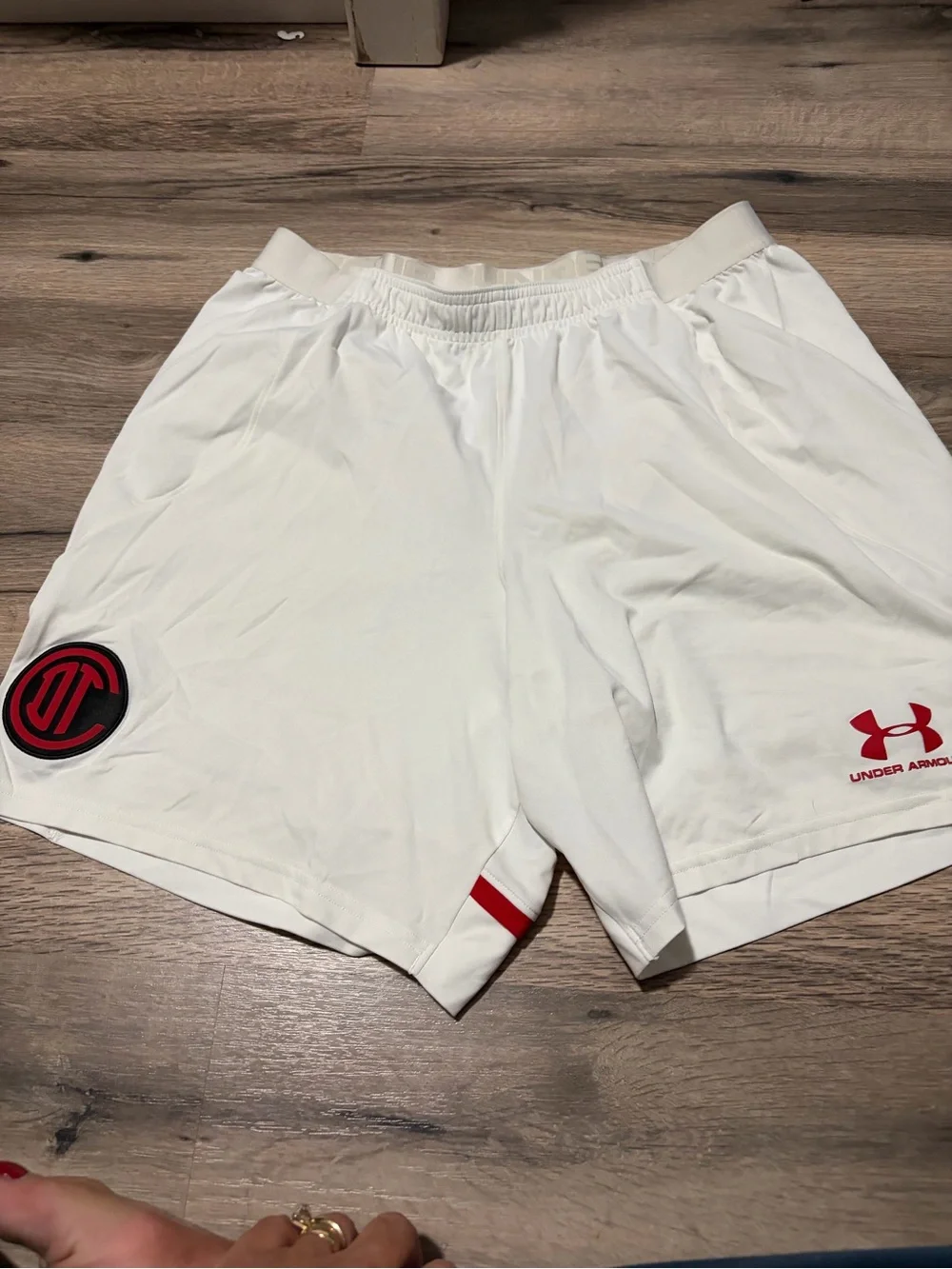 Under Armour White Men’s Athletic soccer Shorts with Red Logo Accents